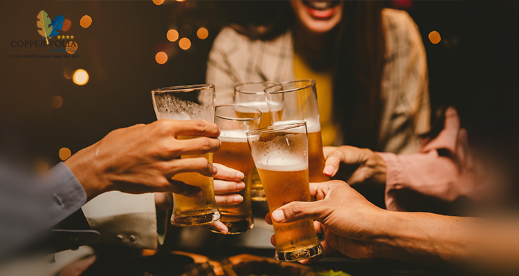 Friends toasting with beer