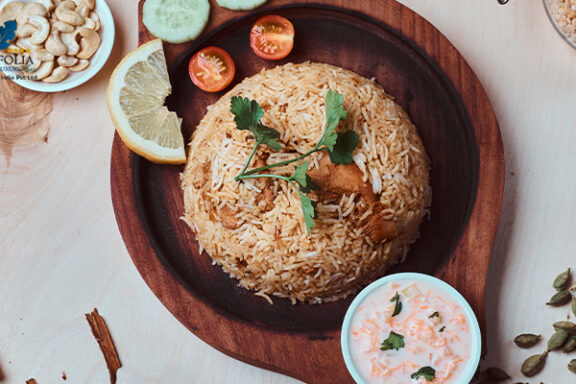 Traditional Kozhikode biriyani with cashews and fresh garnish