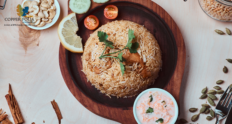 Traditional Kozhikode biriyani with cashews and fresh garnish