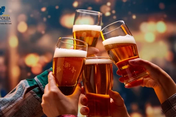 Friends clinking beer glasses and making a cheerful toast