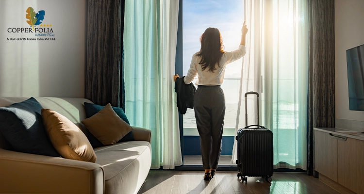 Confident businesswoman relaxing in hotel room near airport