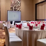 Hotel hall interior with carpet and elegant ceiling lights